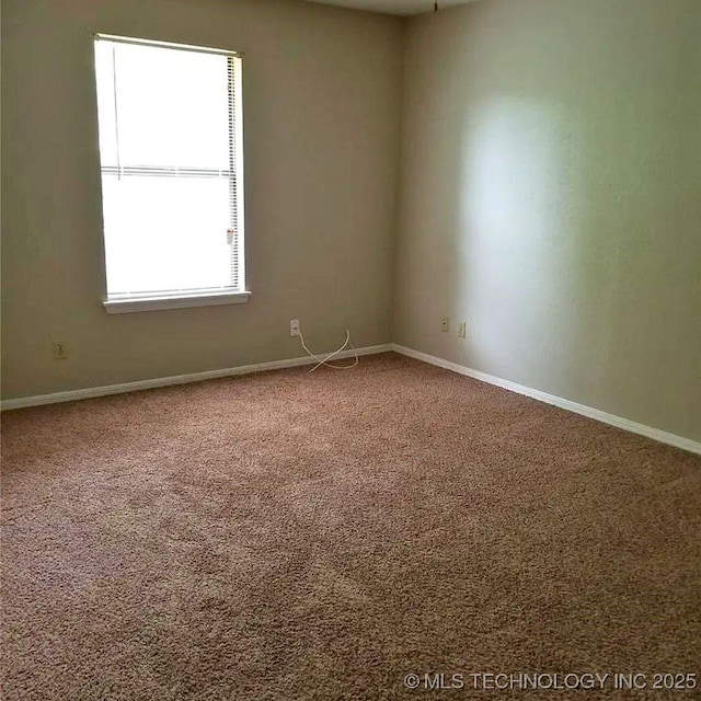 view of carpeted spare room