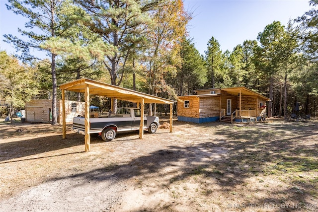 exterior space with a carport