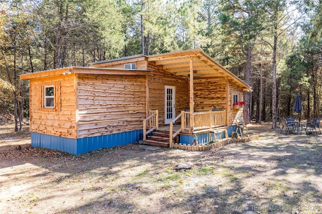 exterior space featuring central AC unit