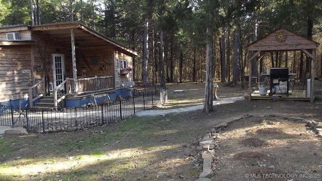 view of yard with fence