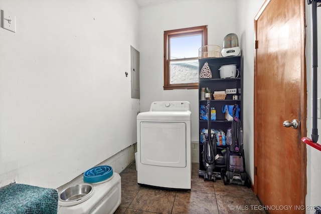 washroom with electric panel and washer / dryer