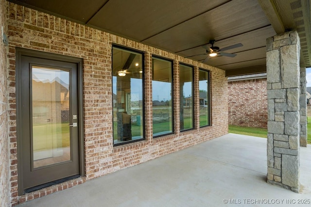 view of patio with a ceiling fan