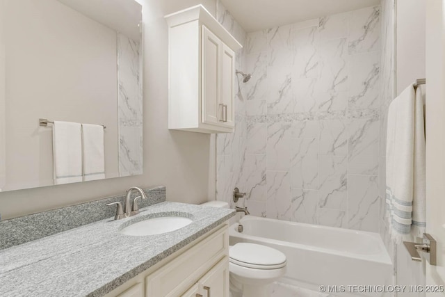 bathroom featuring shower / tub combination, vanity, and toilet