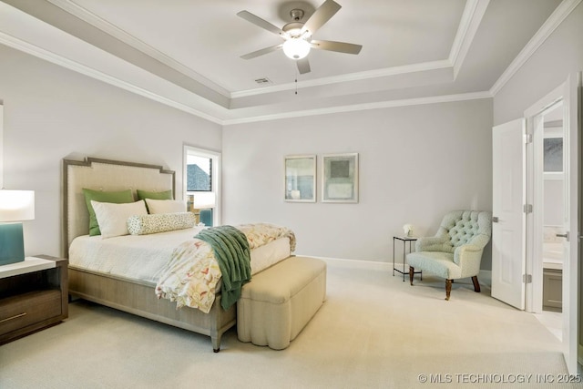 bedroom featuring ornamental molding, carpet, a raised ceiling, and baseboards