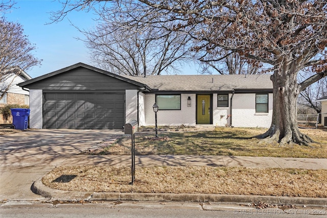 ranch-style home with a garage