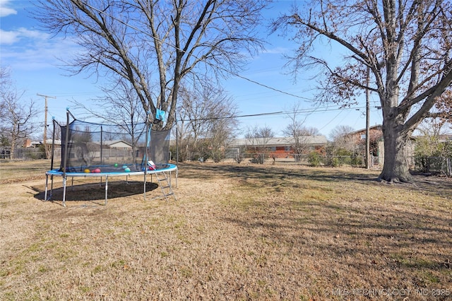 view of yard featuring a trampoline