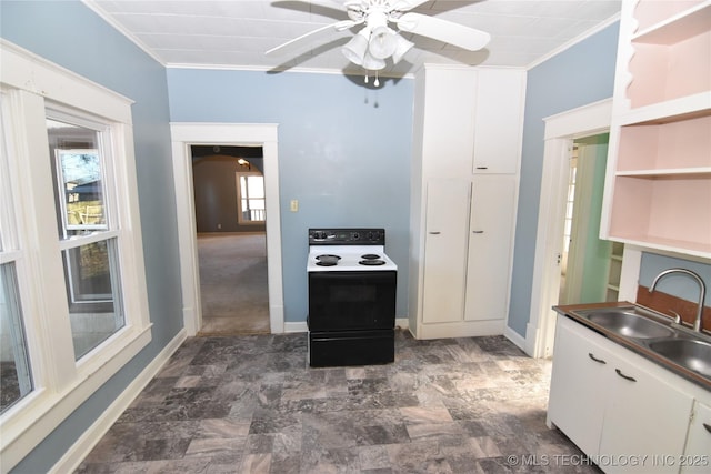 kitchen featuring electric range oven, white cabinetry, sink, ceiling fan, and crown molding