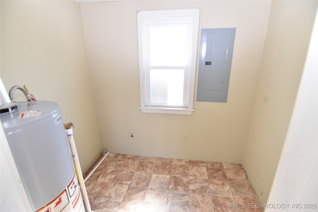 washroom with electric panel and water heater