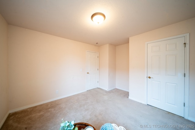 empty room with light carpet