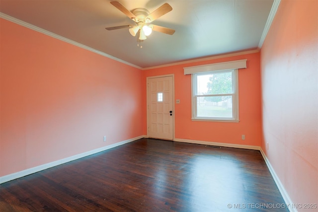 entryway featuring dark hardwood / wood-style flooring, ornamental molding, and ceiling fan