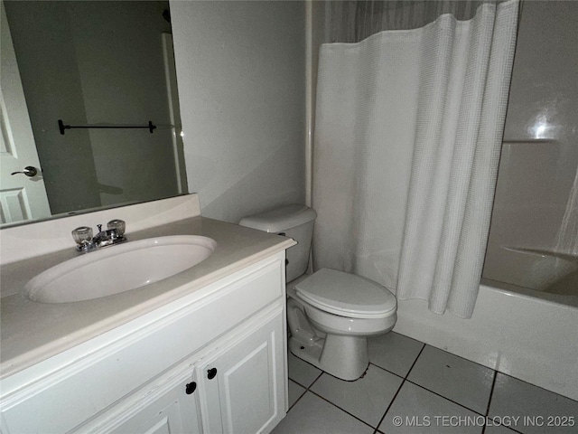 full bathroom featuring tile patterned flooring, vanity, shower / tub combo, and toilet