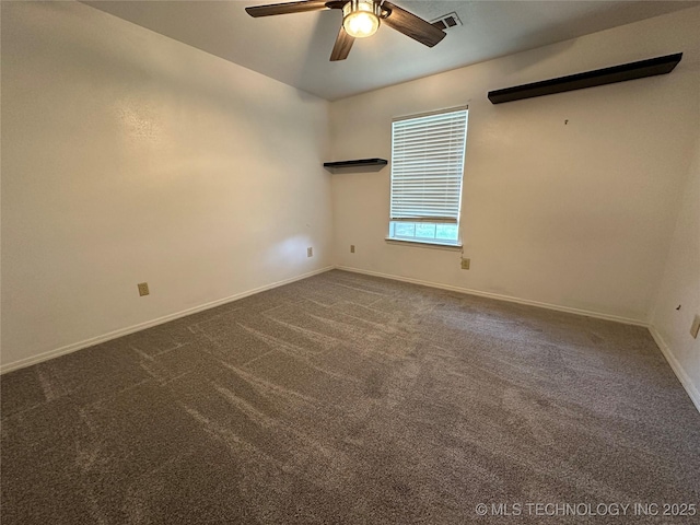310 Northridge, Durant, OK 74701 - spare room with ceiling fan, baseboards, and dark carpet