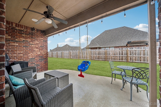 view of patio with ceiling fan