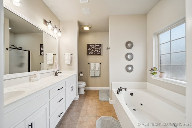 full bathroom featuring vanity, shower with separate bathtub, tile patterned floors, and toilet