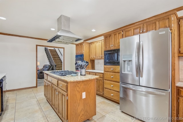 kitchen featuring island exhaust hood, a center island, light tile patterned floors, and black appliances