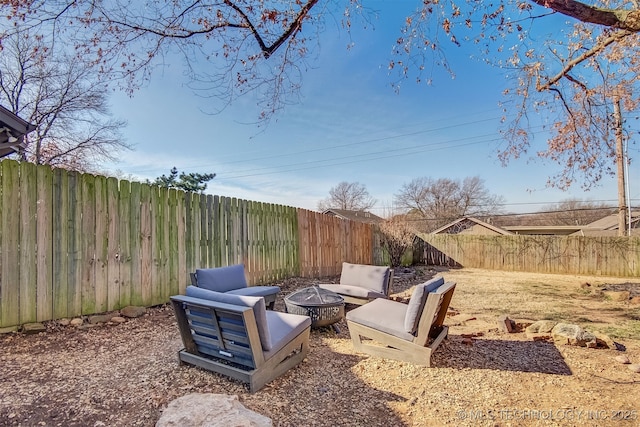 view of yard with a fire pit