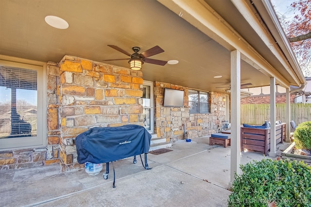 view of patio / terrace with a grill and ceiling fan