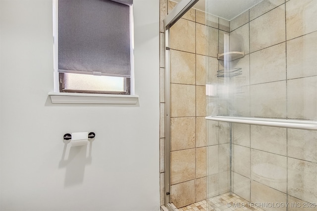 bathroom with an enclosed shower