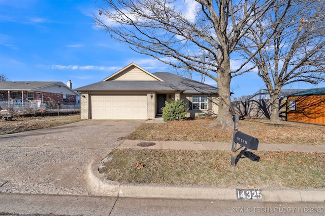 ranch-style house featuring a garage