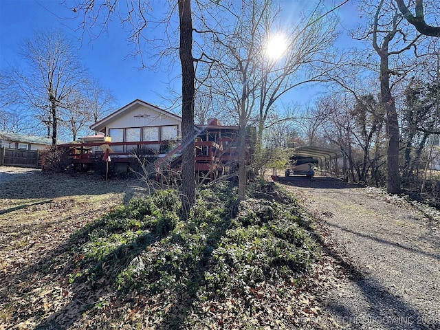 back of house with a wooden deck