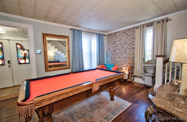 playroom with crown molding, plenty of natural light, dark hardwood / wood-style floors, and pool table