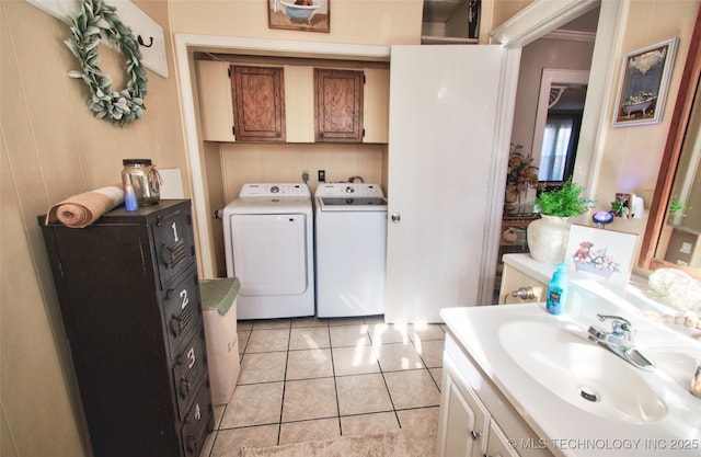 bathroom featuring crown molding, vanity, separate washer and dryer, and tile patterned flooring