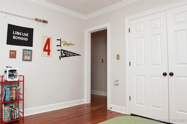 corridor featuring crown molding and dark hardwood / wood-style floors