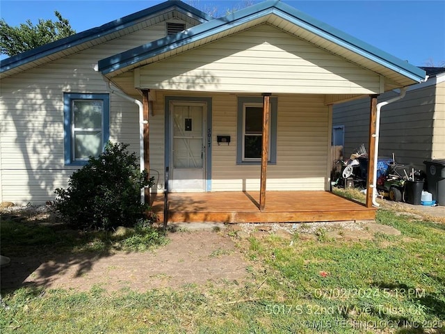 bungalow-style home with covered porch