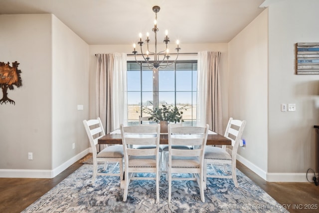 dining room with a notable chandelier