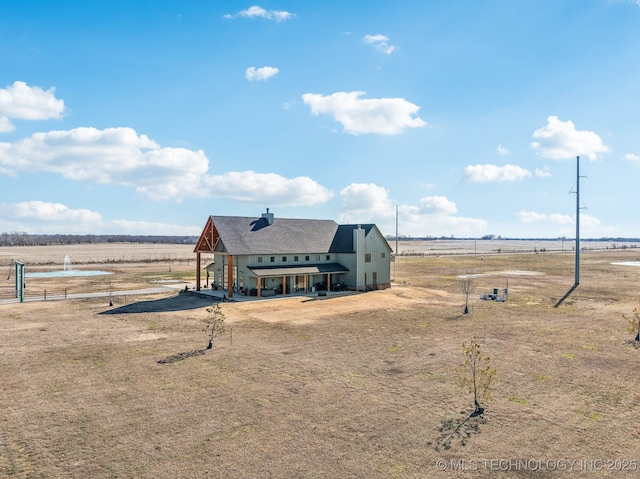 exterior space with a rural view