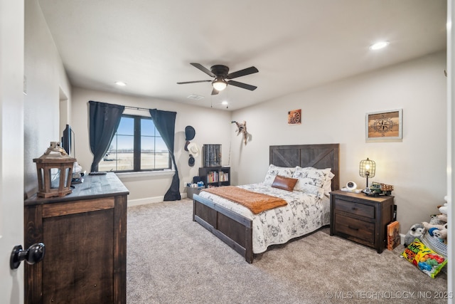 carpeted bedroom featuring ceiling fan