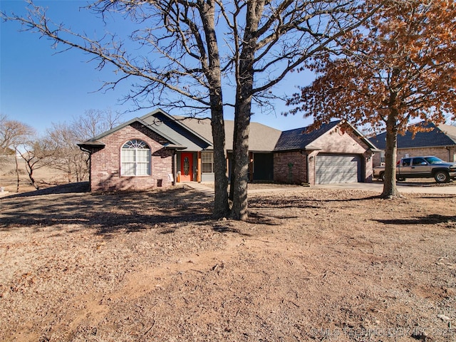 ranch-style home with a garage