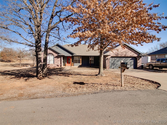 ranch-style home with a garage