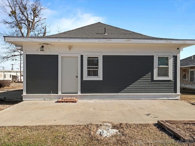 back of property featuring a patio area