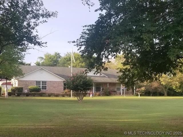 exterior space featuring a front lawn