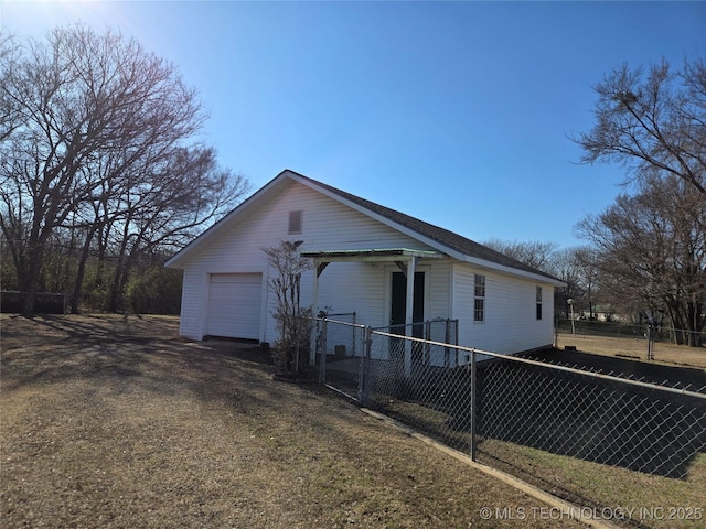 view of home's exterior with a garage