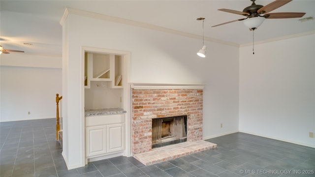 unfurnished living room featuring ceiling fan, ornamental molding, and a fireplace