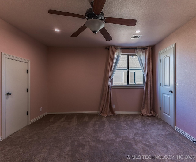 carpeted empty room with recessed lighting, baseboards, visible vents, and a textured ceiling