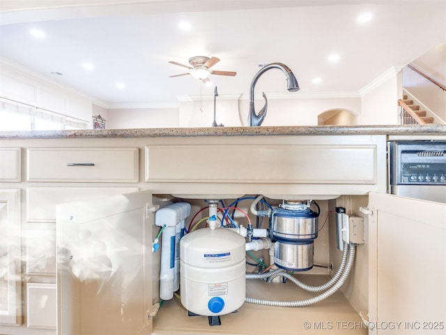 room details with recessed lighting, white cabinetry, a ceiling fan, and ornamental molding