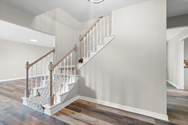 2936 Ridge Rd, Bartlesville, OK 74006 - stairs featuring wood finished floors and baseboards