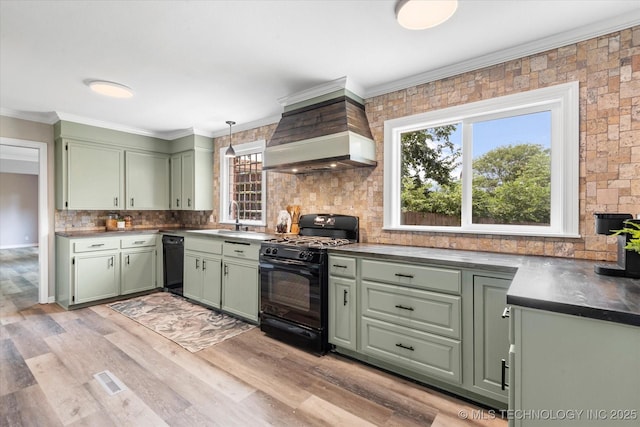 2936 Ridge Rd, Bartlesville, OK 74006 - kitchen featuring green cabinets, black appliances, custom exhaust hood, a sink, and decorative backsplash