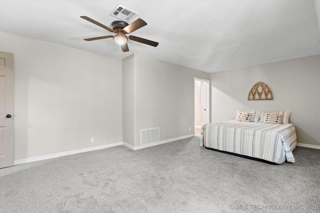2936 Ridge Rd, Bartlesville, OK 74006 - bedroom with carpet flooring, baseboards, and a ceiling fan