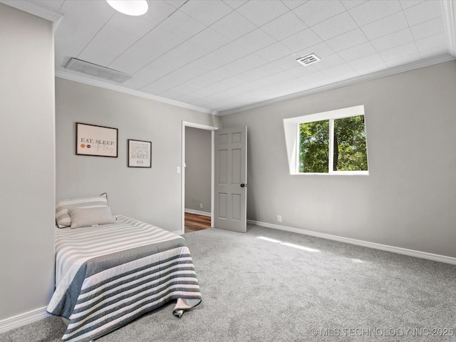 2936 Ridge Rd, Bartlesville, OK 74006 - carpeted bedroom featuring ornamental molding and baseboards