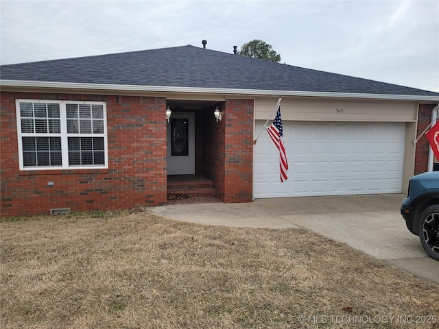 ranch-style house with a garage and a front lawn