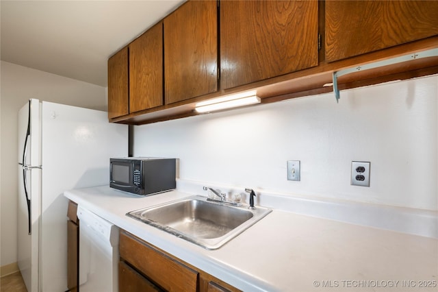 kitchen with dishwasher and sink