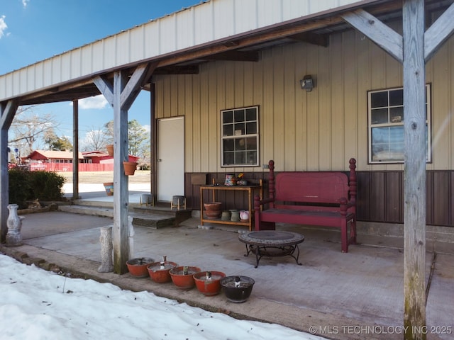 view of snow covered patio