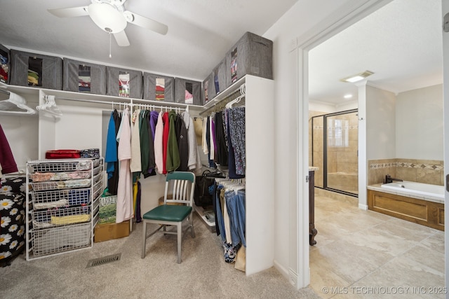 spacious closet featuring ceiling fan