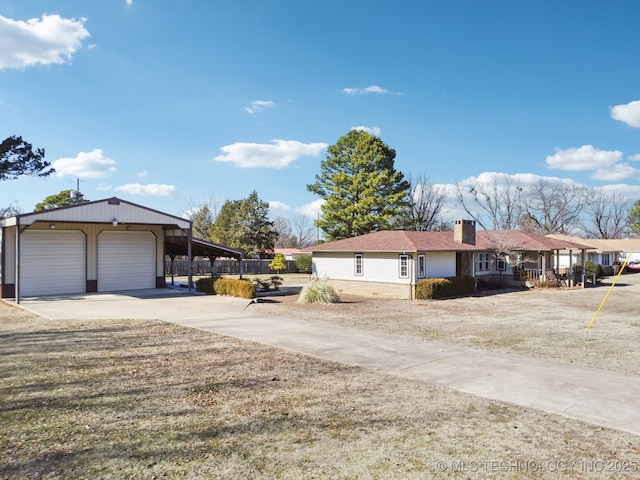 view of side of home with a garage