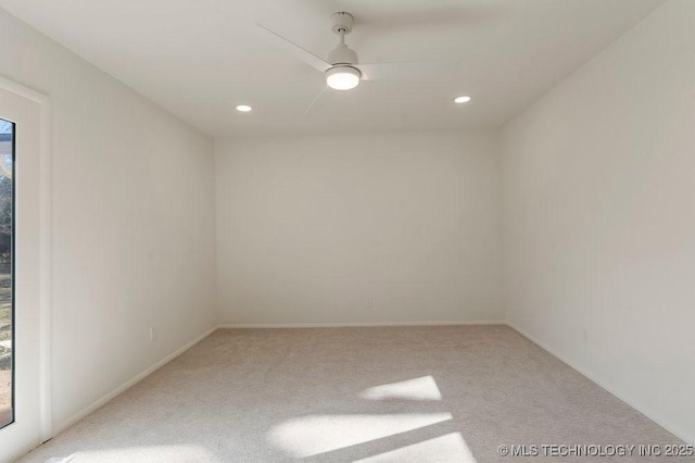 unfurnished room featuring carpet floors and ceiling fan