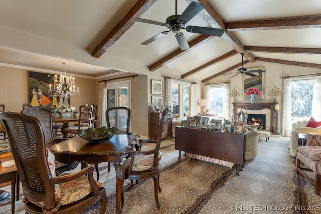 carpeted living room with ceiling fan with notable chandelier and lofted ceiling with beams